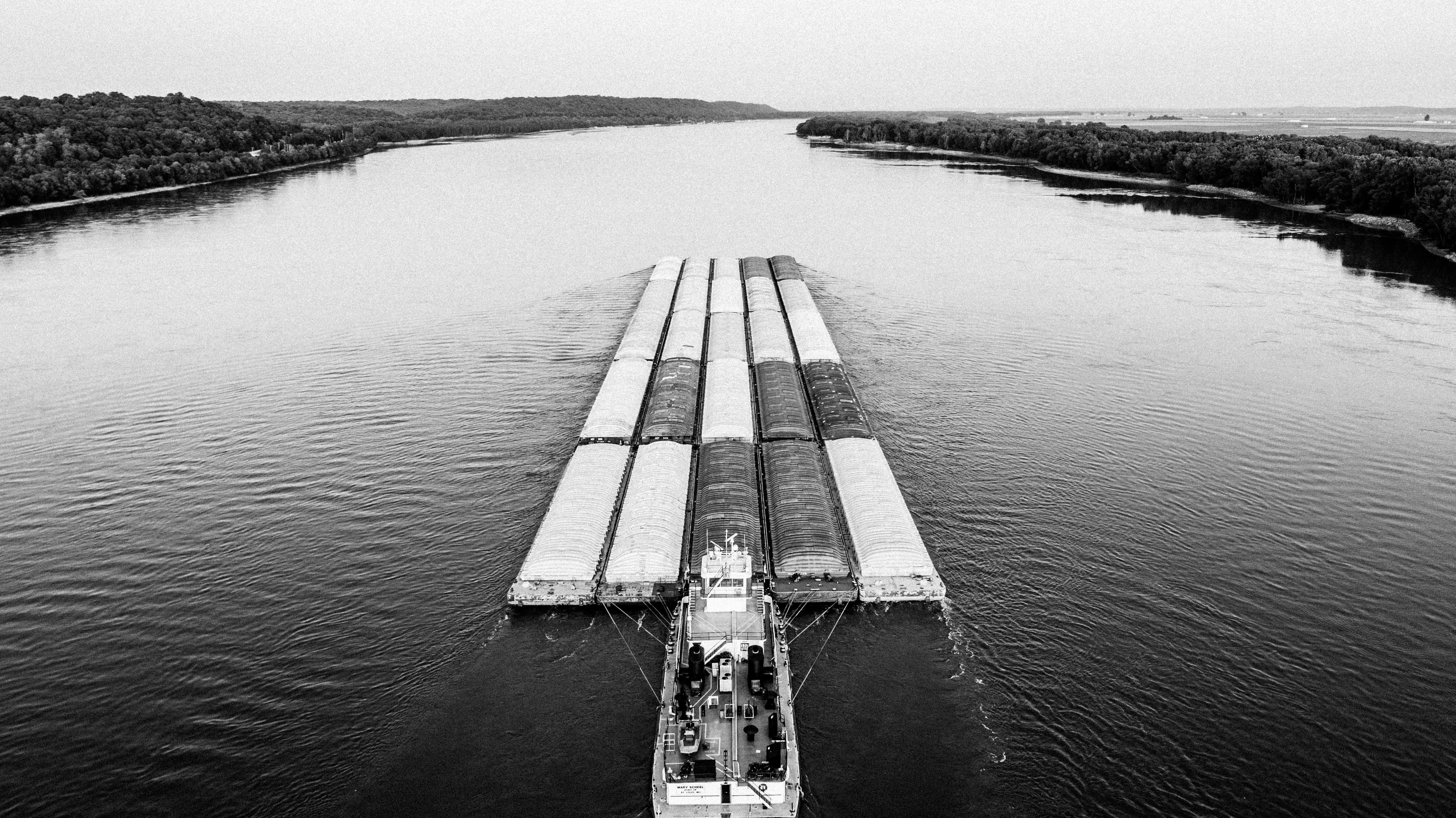 A grain barge heading downriver on the Mississippi
